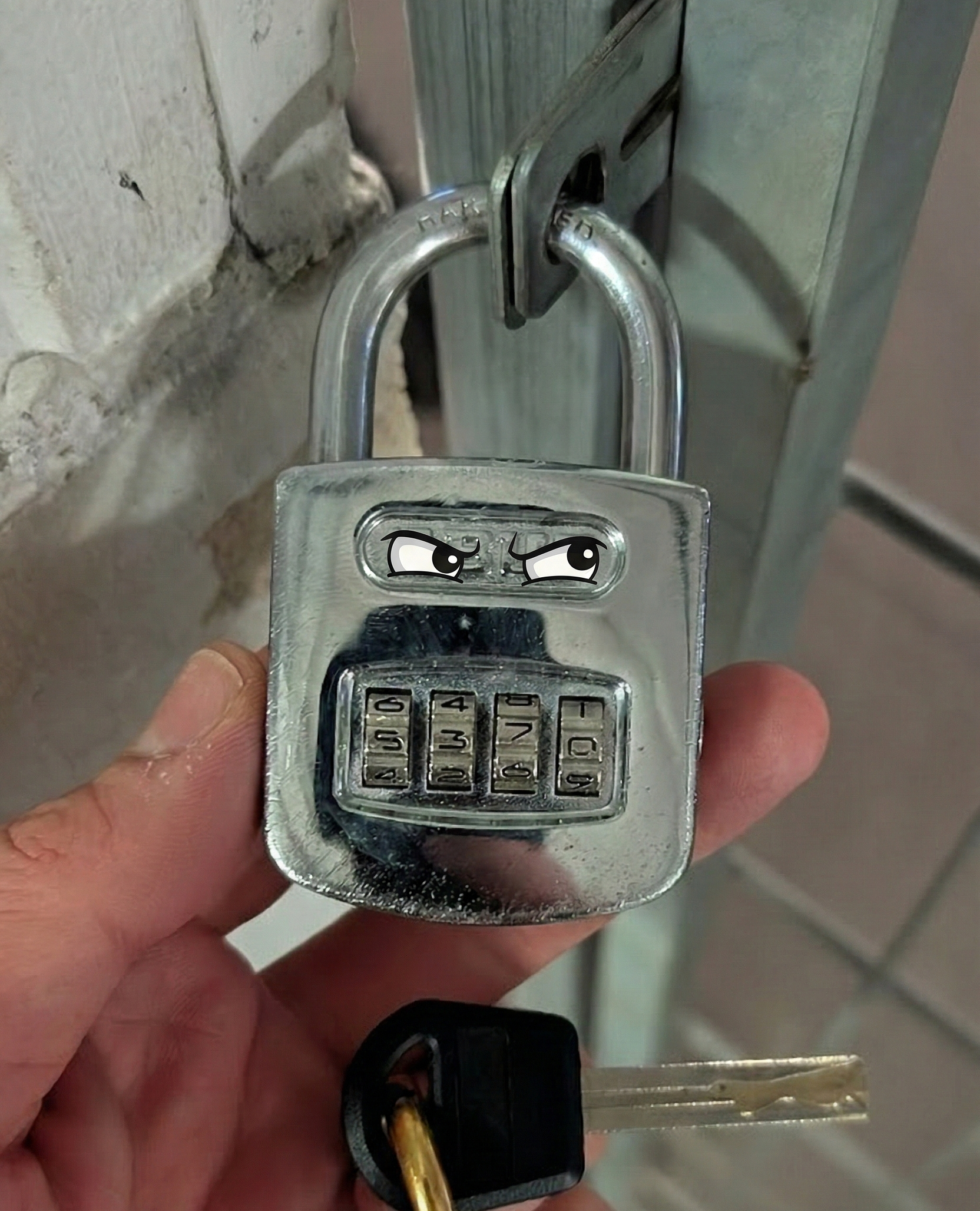 The lock with mischievous eyes drawn on it